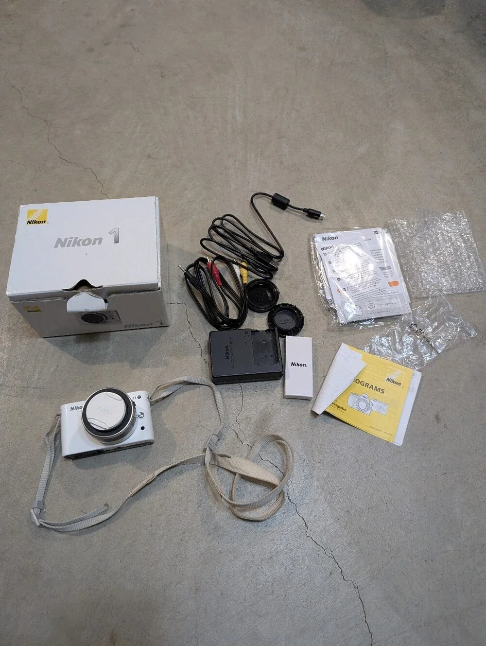 Nikon J1 Mirrorless Digital Camera Turns On Tested Flaw